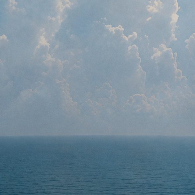 Clouds over a calm sea