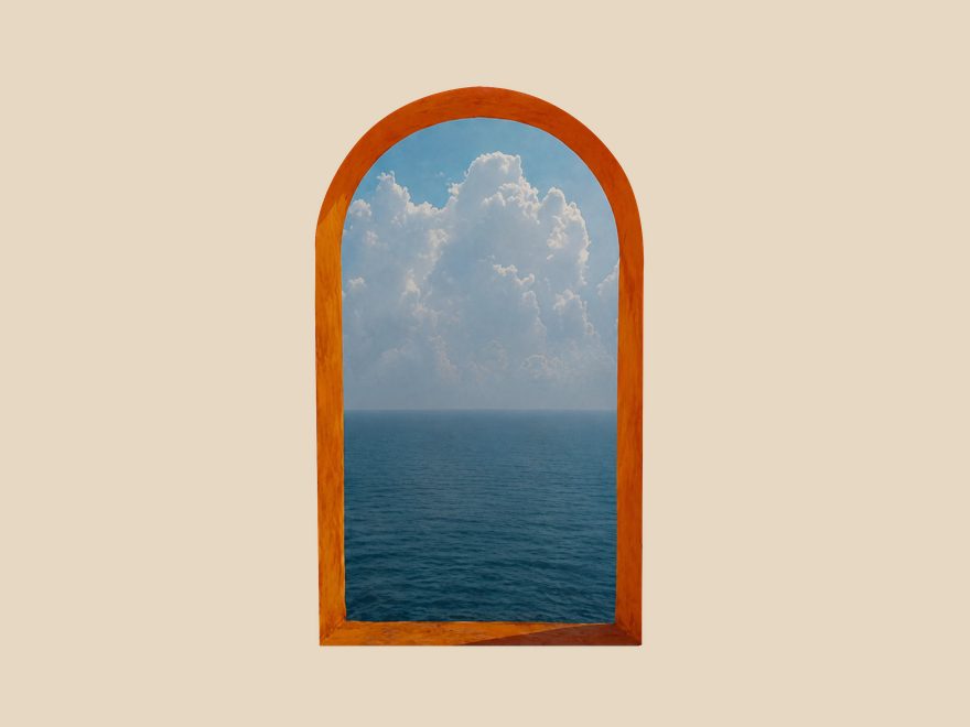 The terracotta arched window framing sky and sea